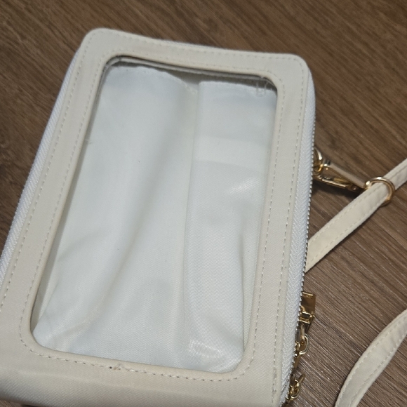 Cream Crossbody Bag with Adjustable Straps and Modern Silhouette - Picture 2 of 4